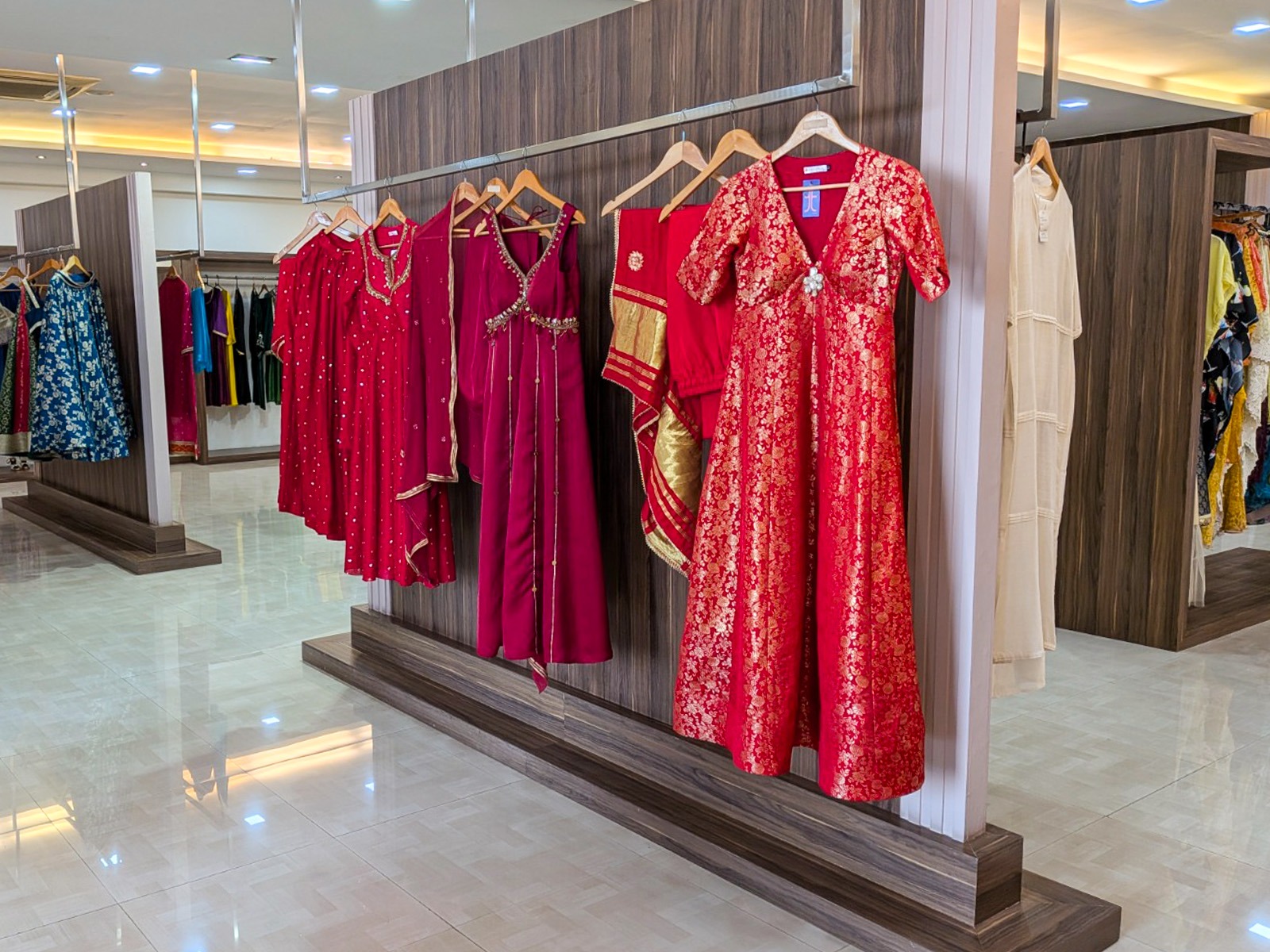 Inside the Tangerine boutique, with fashion displays and a seating area
